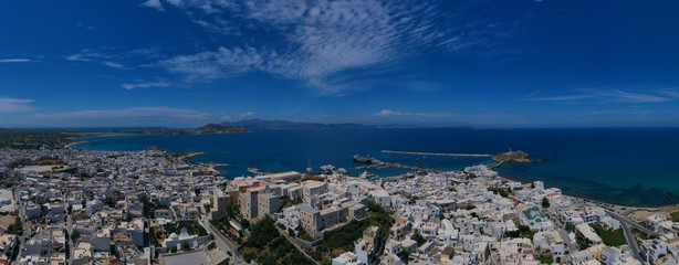 Aerial drone photo of iconic chora, main town of Naxos island featuring beautiful uphill castle...