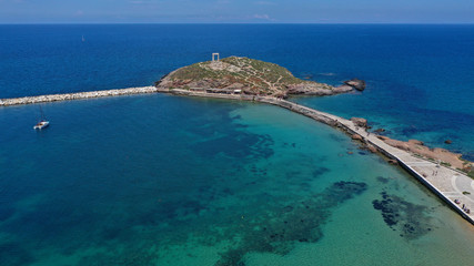 Fototapeta na wymiar Aerial drone panoramic view of iconic and unique Temple of Apollon or Portara (Gate) with breathtaking views to port - town and castle of Naxos island and the Aegean blue sea, Cyclades, Greece