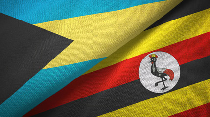 Fototapeta premium Bahamas and Uganda two flags textile cloth, fabric texture