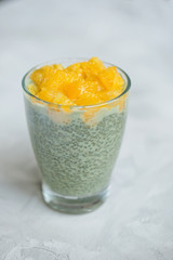 Matcha green tea chia seed pudding dessert. Superfood and vegan concept.