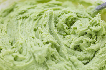 Close up on green cookie dough. Spring holidays cooking concept.