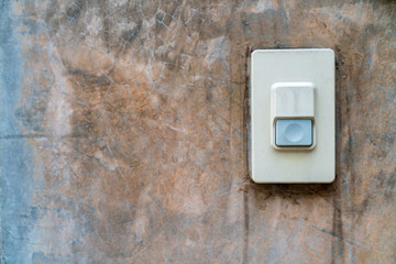 Outlet electricity switch with old cement wall background