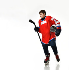 Fototapeta na wymiar boy hockey player in studio silhouette isolated on white background