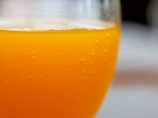 orange juice in glass Cup