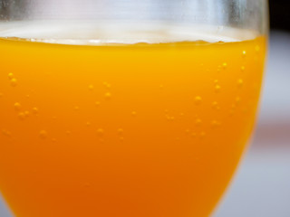 orange juice in glass Cup