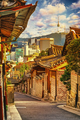 Fototapeta na wymiar The view of Namsan Tower at Bukchon Hanok village in Seoul, South Korea. Hanok is a term to describe Korean traditional houses. 