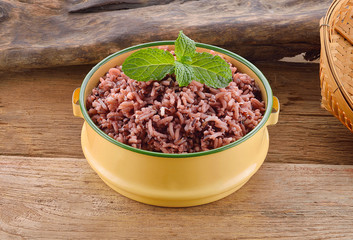 Rice on a wooden background