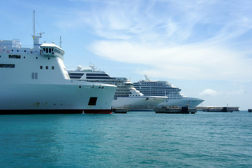 Fototapeta na wymiar Big white ships in the port of Ibiza.