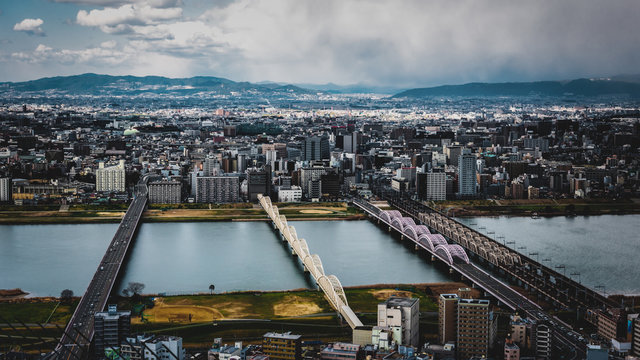 Osaka City view and Yodogawa River in Japan on Floating Garden Rooftop observation area and panorama 360 views of Umeda Sky Building in Japan