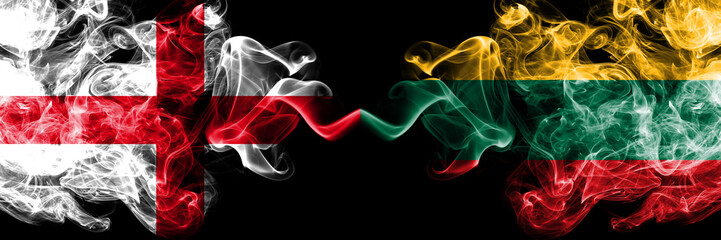English vs Lithuania, Lithuanian smoky mystic flags placed side by side. Thick colored silky smokes flag of England and Lithuania, Lithuanian.