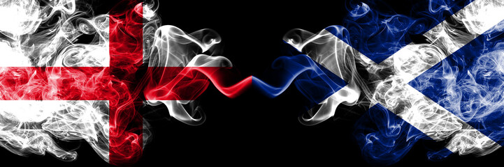 English vs Scotland, Scottish smoky mystic flags placed side by side. Thick colored silky smokes flag of England and Scotland, Scottish.