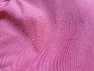 Pink background fabric Swaying like a silk thread when hit by the wind.