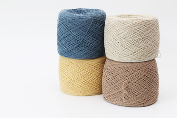 kintting yarn balls on white backgroud, many color for crafter