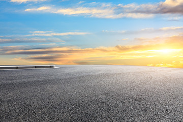 Fototapeta premium Empty road and sky nature landscape at sunrise