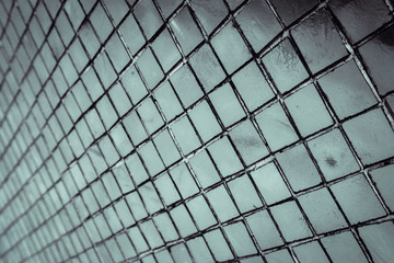 Beautiful closeup textures abstract tiles and silver and white color glass wall background and pattern