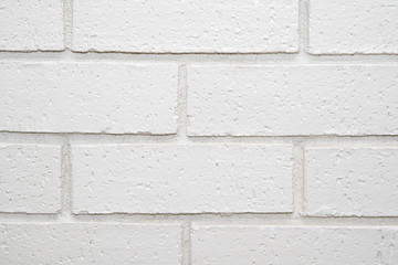 White painted brick wall close up.