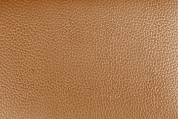 Brown leather background texture close up