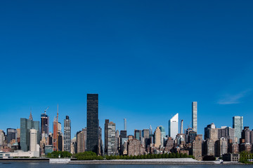 Midtown Manhattan cityscape on a bright sunny day