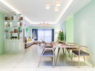 In the dining room area of the living room, the tableware has been placed