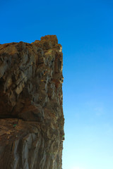 Sail Rock, sandstone monolith, landmark of black sea coast of Russia against blue sky