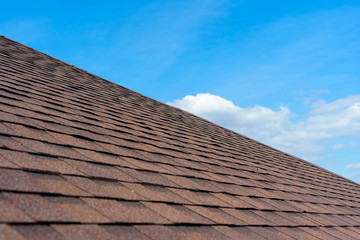 Asphalt tile roof on new home under construction