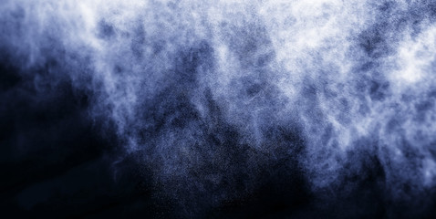 A stream of water and a cloud of drops