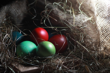 Easter painted eggs on burlap