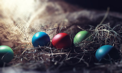 Easter painted eggs on burlap