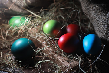 Easter painted eggs on burlap