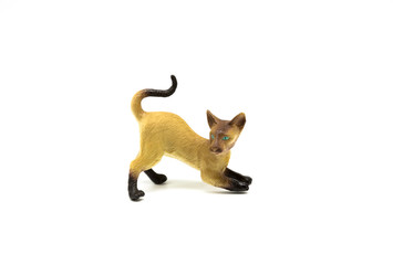 Toy plastic cat isolated on white background