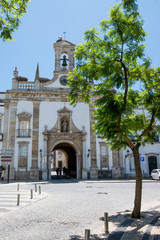 Obraz premium Faro, Portugal, July 25, 2018: Arch of Faro, main entrance to old town Faro, Portugal