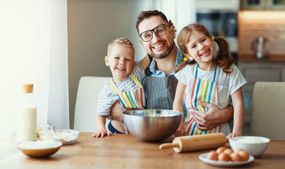 father with children   baking cookies