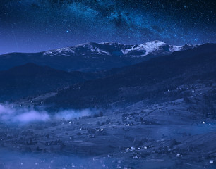 Naklejka na ściany i meble Alpine carpathian village at night