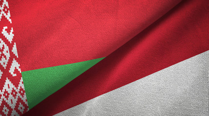 Belarus and Indonesia two flags textile cloth, fabric texture