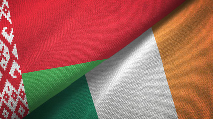 Belarus and Ireland two flags textile cloth, fabric texture