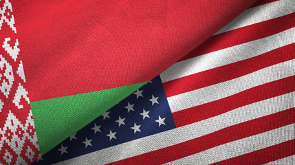 Obraz premium Belarus and United States two flags textile cloth, fabric texture
