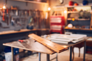 Retro / vintage workshop with misc. tools. Blurred image for background.