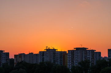 Fototapeta na wymiar Sunset over city landscape