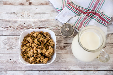 healthy breakfast. bowl with cereals and milk on wooden background