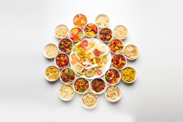 Snack pellets are non-expanded products made with raw materials like cereals, potatoes or vegetable powders, later processed using frying, hot air baking. multicoloured / shaped ready-to-eat snacks