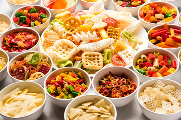 Snack pellets are non-expanded products made with raw materials like cereals, potatoes or vegetable powders, later processed using frying, hot air baking. multicoloured / shaped ready-to-eat snacks