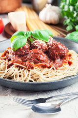 Spaghetti pasta with meatballs and tomato sauce