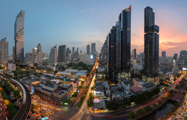 Fototapeta na wymiar Cityscape view of Silom Downtown in Bangkok city central business downtown at sunset