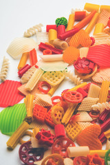 Snack pellets are non-expanded products made with raw materials like cereals, potatoes or vegetable powders, later processed using frying, hot air baking. multicoloured / shaped ready-to-eat snacks