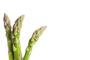 Three asparagus stems, close up, isolated on white background
