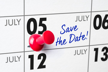 Wall calendar with a red pin - July 05