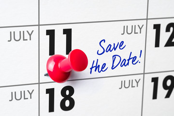 Wall calendar with a red pin - July 11