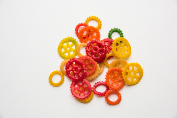 Snack pellets are non-expanded products made with raw materials like cereals, potatoes or vegetable powders, later processed using frying, hot air baking. multicoloured / shaped ready-to-eat snacks