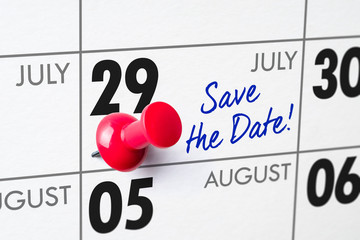 Wall calendar with a red pin - July 29