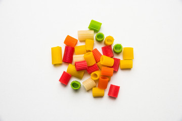Obraz premium Snack pellets are non-expanded products made with raw materials like cereals, potatoes or vegetable powders, later processed using frying, hot air baking. multicoloured / shaped ready-to-eat snacks